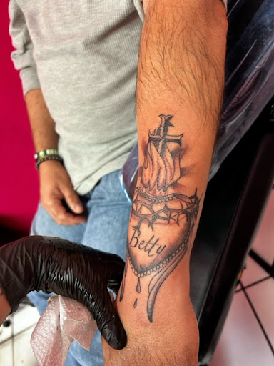 Explore cherub angel tattoo ideas, creative tattoo ideas in Fort Pierce, available at South Florida Tattoo Co Inc