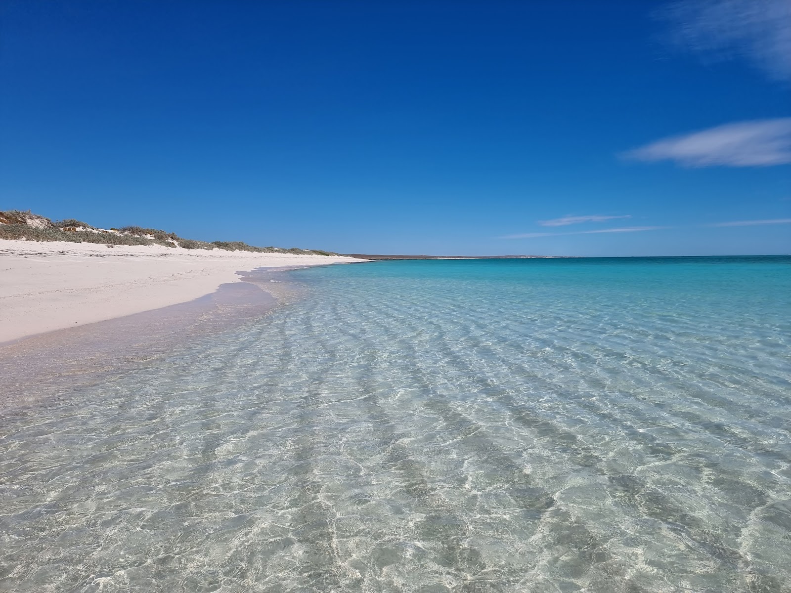 14 Mile Beach'in fotoğrafı düz ve uzun ile birlikte