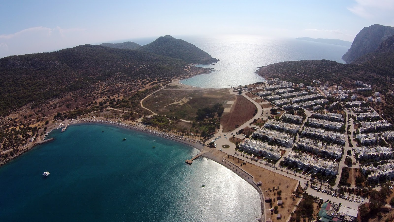 Photo of Tisan beach with spacious bay