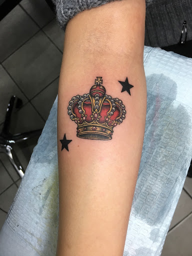 Explore face tattoos for men ideas, creative tattoo ideas in Chicago, available at Royal Flesh Tattoo and Piercing