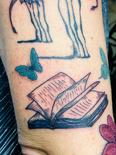 Explore simple silver lining tattoo ideas, creative tattoo ideas in North Tonawanda, available at Dark Side Ink Tattoo Studio