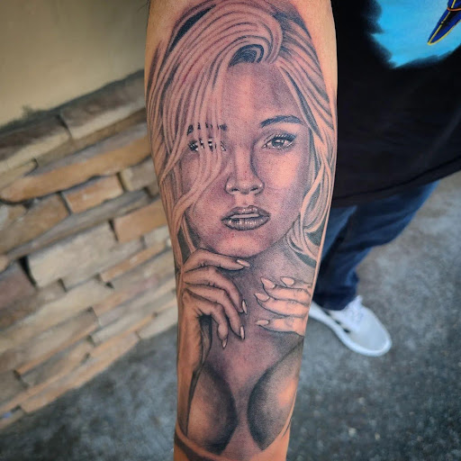 Explore neck tattoos for women ideas, creative tattoo ideas in Winston Salem, available at Inktellectuals Art Gallery