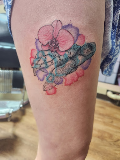 Explore loyalty over love tattoo ideas, creative tattoo ideas in Fort Worth, available at Randy Adams Tattoo Studio