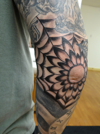 Explore tattoo wolf ideas, creative tattoo ideas in Hooksett, available at Skin Deep Tribal Tattoo