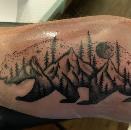 Find beach scene tattoo ideas for your next unique tattoo in Falls City at Studio 1816 Tattoos