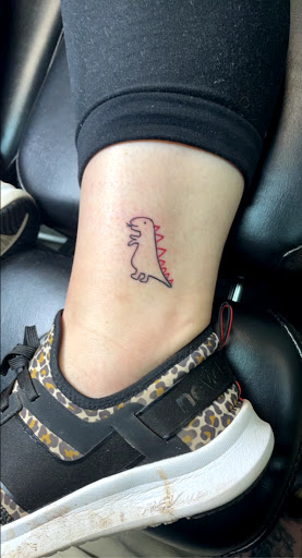 Explore shark tooth tattoo ideas, creative tattoo ideas in Meridian, available at Creative Pain Tattoo Studio