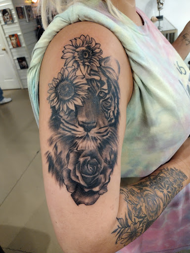 Explore coastal tattoo ideas, creative tattoo ideas in Bowling Green, available at Clean Line Tattoos