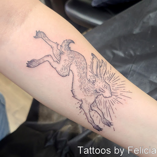 Explore gravestone tattoo ideas, creative tattoo ideas in Fort Myers, available at Tiger Lotus Tattoo and Piercing