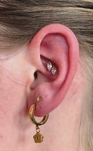 Explore hand skull tattoo ideas, creative tattoo ideas in Providence, available at Adorned Studio