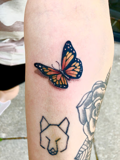 Explore leg tattoo ideas black male, creative tattoo ideas in Deerfield, available at Maximum Tattoo