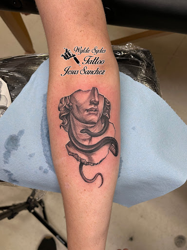 Explore puzzle piece tattoo ideas, creative tattoo ideas in San Diego, available at Wylde Sydes Tattoo & Body Piercing