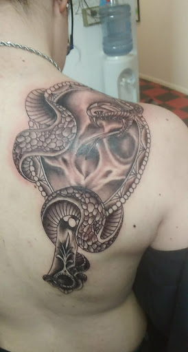 Explore house tattoo ideas, creative tattoo ideas in Fort Dodge, available at Black Diamond Tattoo Studio