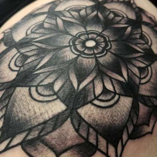 Explore surreal tattoo ideas, creative tattoo ideas in Lakeland, available at Black Swan Tattoo