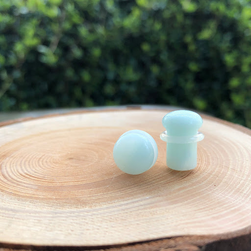 Explore arm flower tattoo ideas, creative tattoo ideas in Olympia, available at Metro Body Piercing