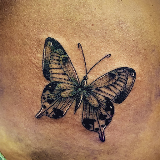 Explore religious cross tattoo ideas, creative tattoo ideas in Satellite Beach, available at Rocksteady Tattoo Company