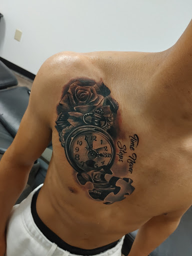 Explore dead rose tattoo ideas, creative tattoo ideas in Hereford, available at Slow Pain Tattoo Body Art Studio