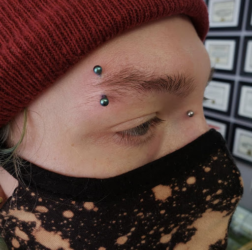 Explore small fingerprint tattoo ideas, creative tattoo ideas in Edison, available at Black Moon Piercing