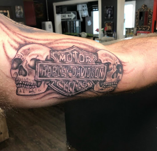 Explore snail tattoo ideas, creative tattoo ideas in East Windsor, available at AAA Tattoo