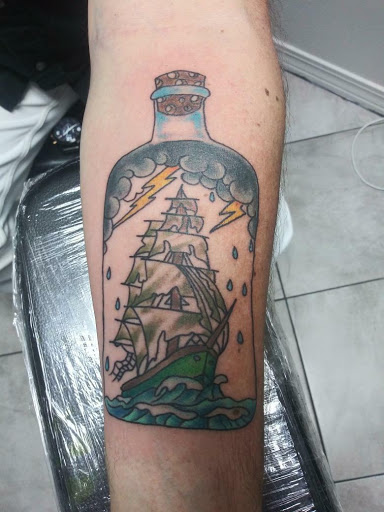 Explore alice in wonderland tattoo ideas, creative tattoo ideas in Orange Park, available at All Aces Tattoo and Body Piercing LLC