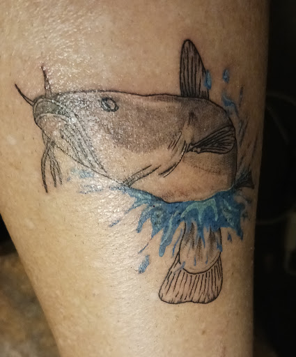 Explore black metal tattoo ideas, creative tattoo ideas in Onalaska, available at Rock Bottom Tattoo Studio