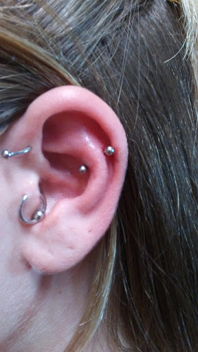 Explore good tattoo ideas for sisters, creative tattoo ideas in Merrick, available at Wyld Chyld Tattoo