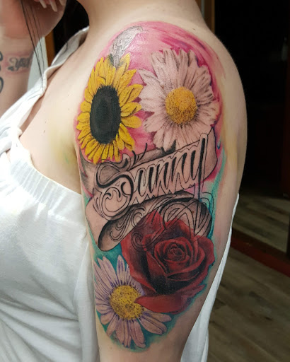 Explore tribal bear tattoo ideas, creative tattoo ideas in Fresno, available at Happy Client Tattoo