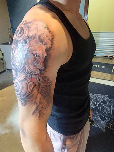 Explore godfather tattoo ideas, creative tattoo ideas in Coeur D Alene, available at 2 Ravens Tattoo Studio