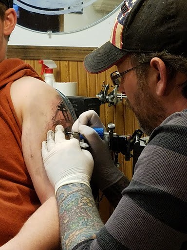Explore city morgue tattoo ideas, creative tattoo ideas in Johnstown, available at Screaming Needle Tattoo & Body Piercing