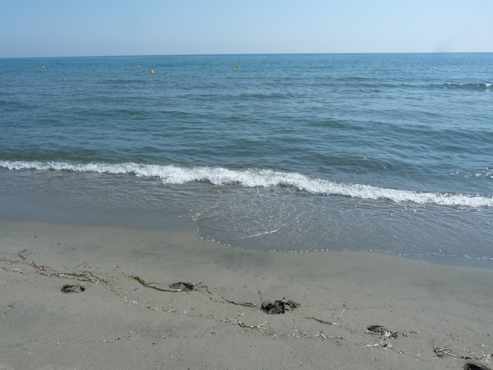 Zdjęcie Plage de la Marana z proste i długie