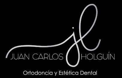 Dr. Juan Carlos Holguin - Ortodoncia Y Estetica Dental