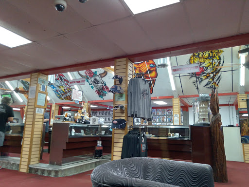 Explore mardi gras tattoo ideas, creative tattoo ideas in Panama City Beach, available at Oxygen Tattoo and Body Piercing Studio