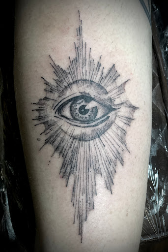 Explore leopard print tattoo ideas, creative tattoo ideas in Kansas City, available at Steel Panther Tattoo