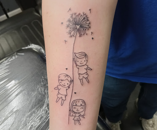 Explore tattoo fill in ideas for men, creative tattoo ideas in Toledo, available at Ellis Ink