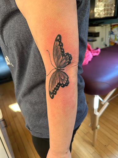 Explore strawberry tattoo ideas, creative tattoo ideas in Calumet, available at Tattooing by Big Ben