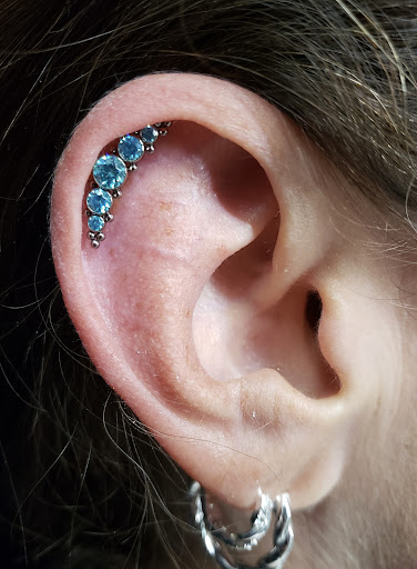 Explore singer tattoo ideas, creative tattoo ideas in Addison, available at Cat Tattoo