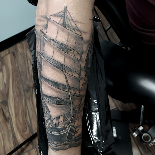 Explore symbol tattoo ideas, creative tattoo ideas in Calhoun, available at A Sailors Grave Tattoo Parlor