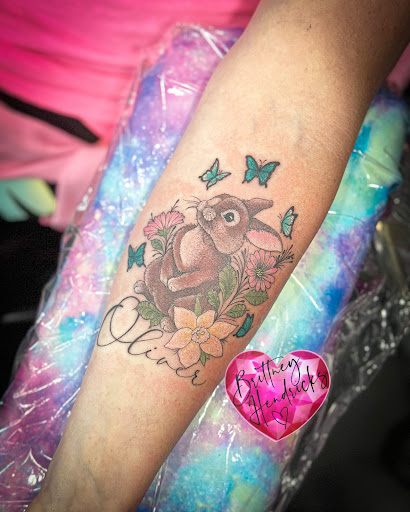 Explore rhea ripley tattoo ideas, creative tattoo ideas in Sevierville, available at Jaded Art Collective