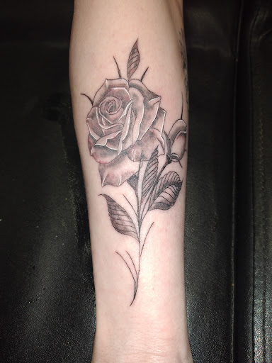 Explore mens infinity tattoo ideas, creative tattoo ideas in Kewanee, available at Splat Ink tattoos and piercings