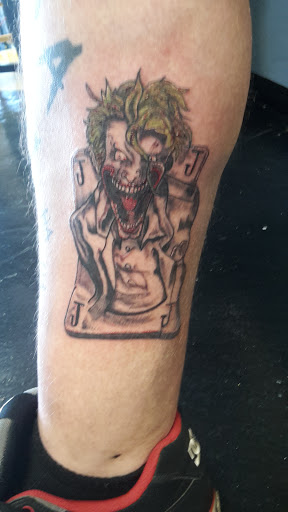 Explore women's lower back tattoo ideas, creative tattoo ideas in Warner Robins, available at McDonald Ink