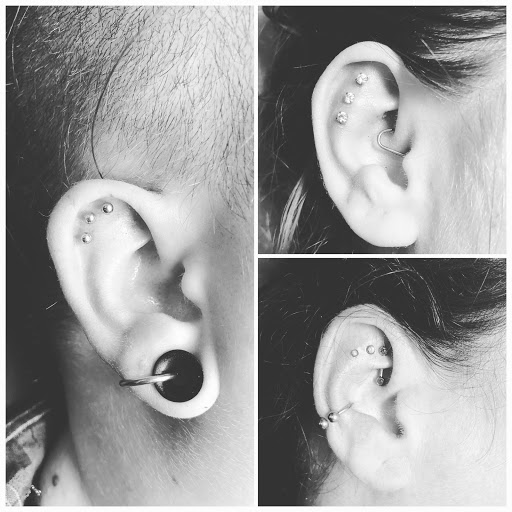 Explore music tattoo sleeve ideas, creative tattoo ideas in Bloomington, available at Evil by the Needle Custom Tattoo and Piercing Studio