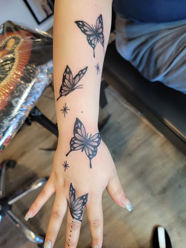 Explore woman leg tattoo ideas, creative tattoo ideas in Tremonton, available at Ink Syndicate Tattoo Studio