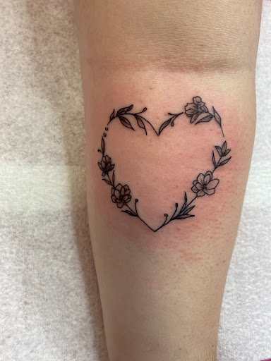 Explore gun tattoo ideas, creative tattoo ideas in Lake City, available at Crooked Spines Tattoo Studio
