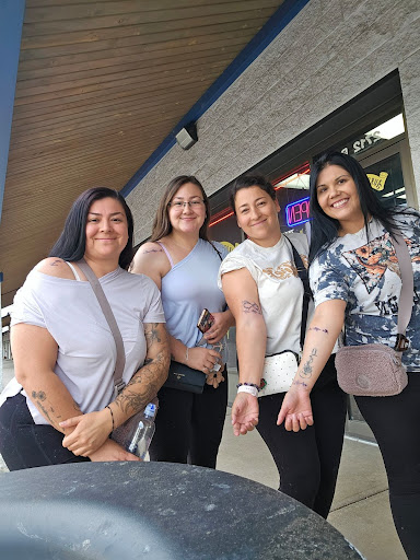 Explore lower half sleeve tattoo ideas for females, creative tattoo ideas in Aurora, available at Aurora Tattoo Company