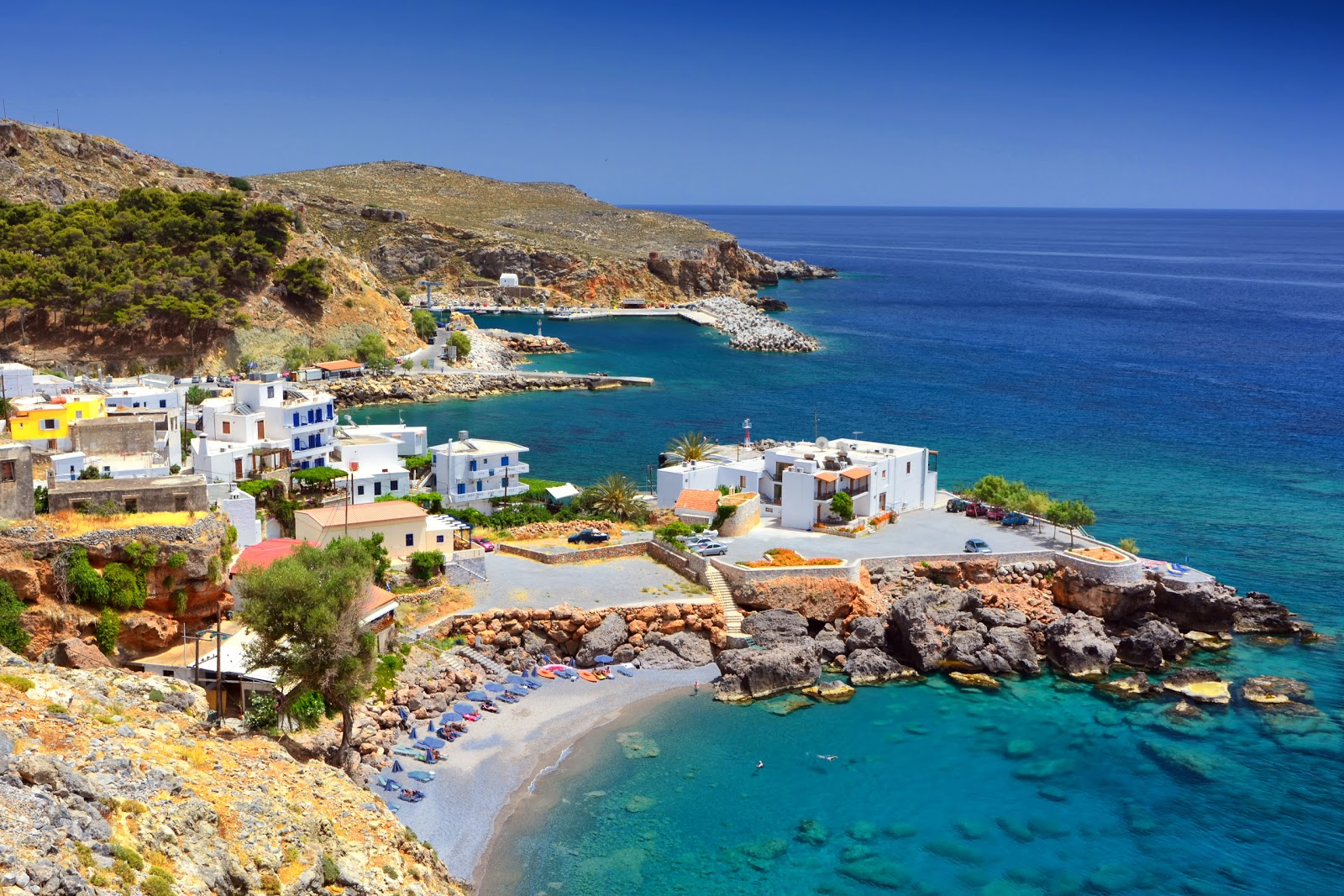 Photo of Vrissi beach with turquoise pure water surface