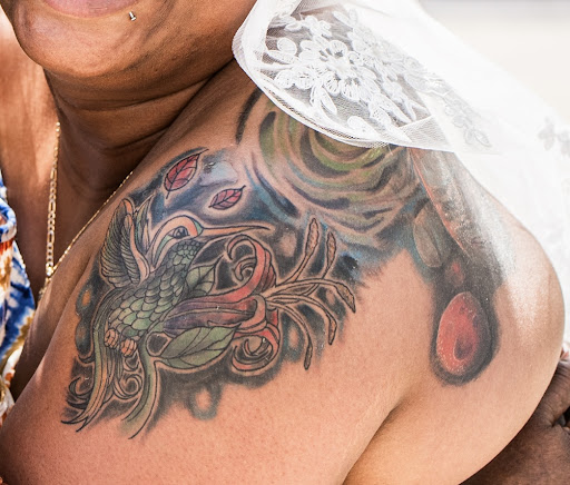 Explore name cover up tattoo ideas male, creative tattoo ideas in Greensboro, available at Little Johns Tattoo