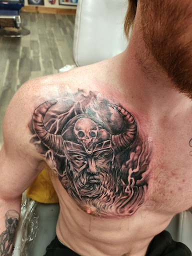 Explore chest tattoos for men ideas, creative tattoo ideas in Coeur D Alene, available at Inkworld Tattoo