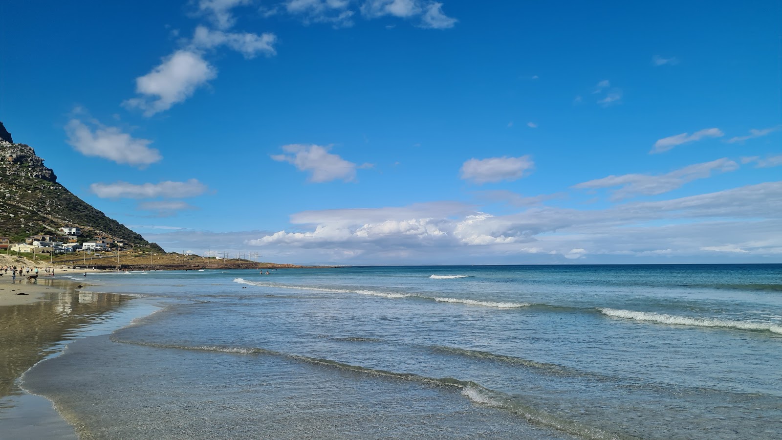 Fotografija Glencairn beach z turkizna čista voda površino