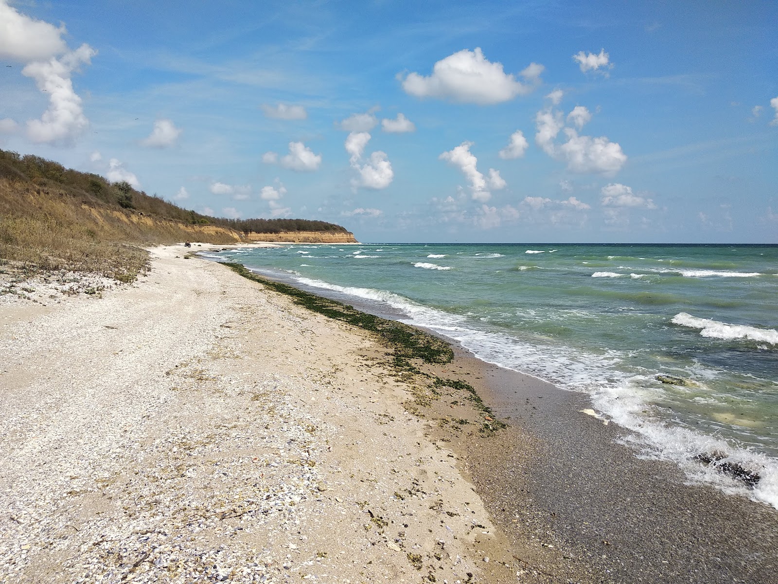 Zdjęcie Durankulak beach z powierzchnią beżowy piasek muszlowy