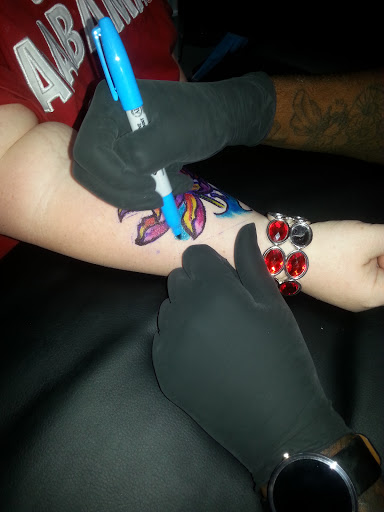 Explore tattoo name cover up ideas, creative tattoo ideas in Anniston, available at Wicked Game Tattoo & Piercing Studio