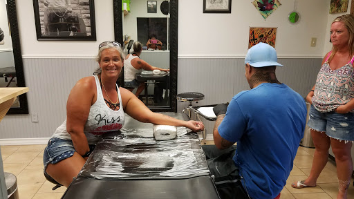 Tattoo Shop «magnum opus tattoo company», reviews and photos, 1817 Padre Blvd #4, South Padre Island, TX 78597, USA